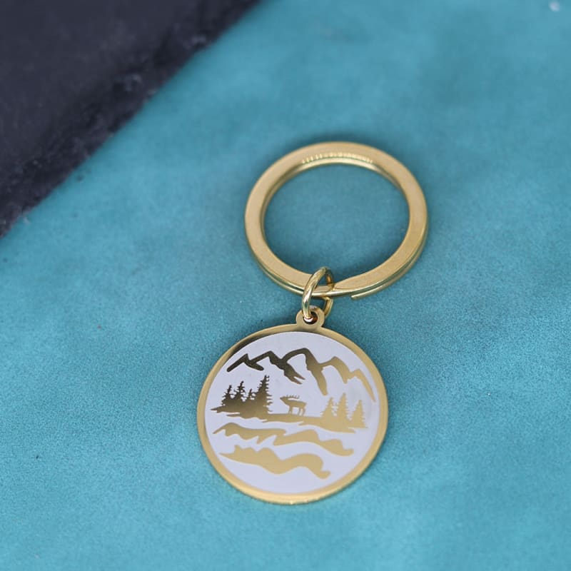 porte clé montagne pour randonneuse